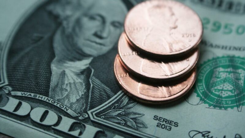 Minimum Wage With Dollar & Pennies High Quality Stock Photo