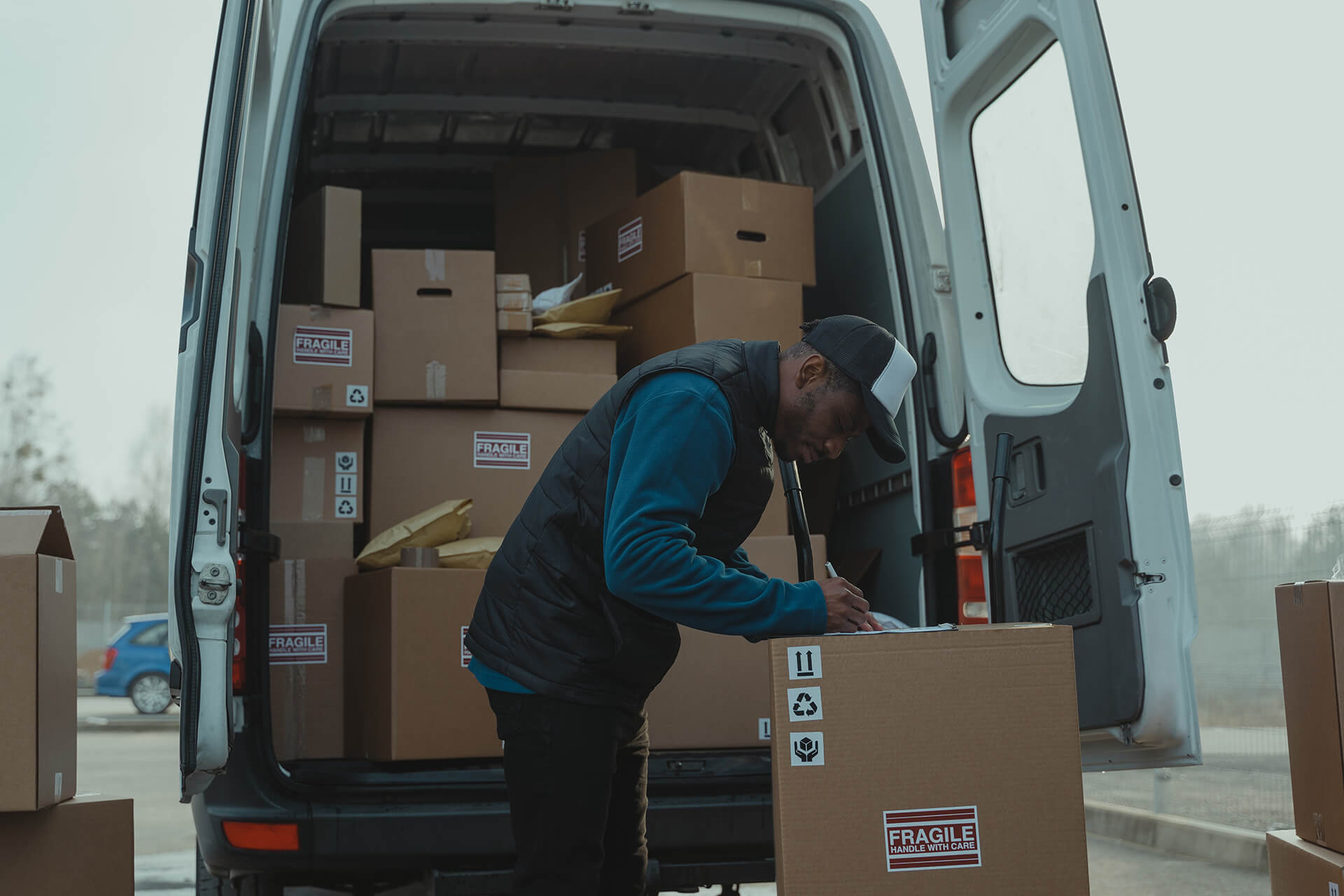 Man With Boxes In Truck Inland Marine