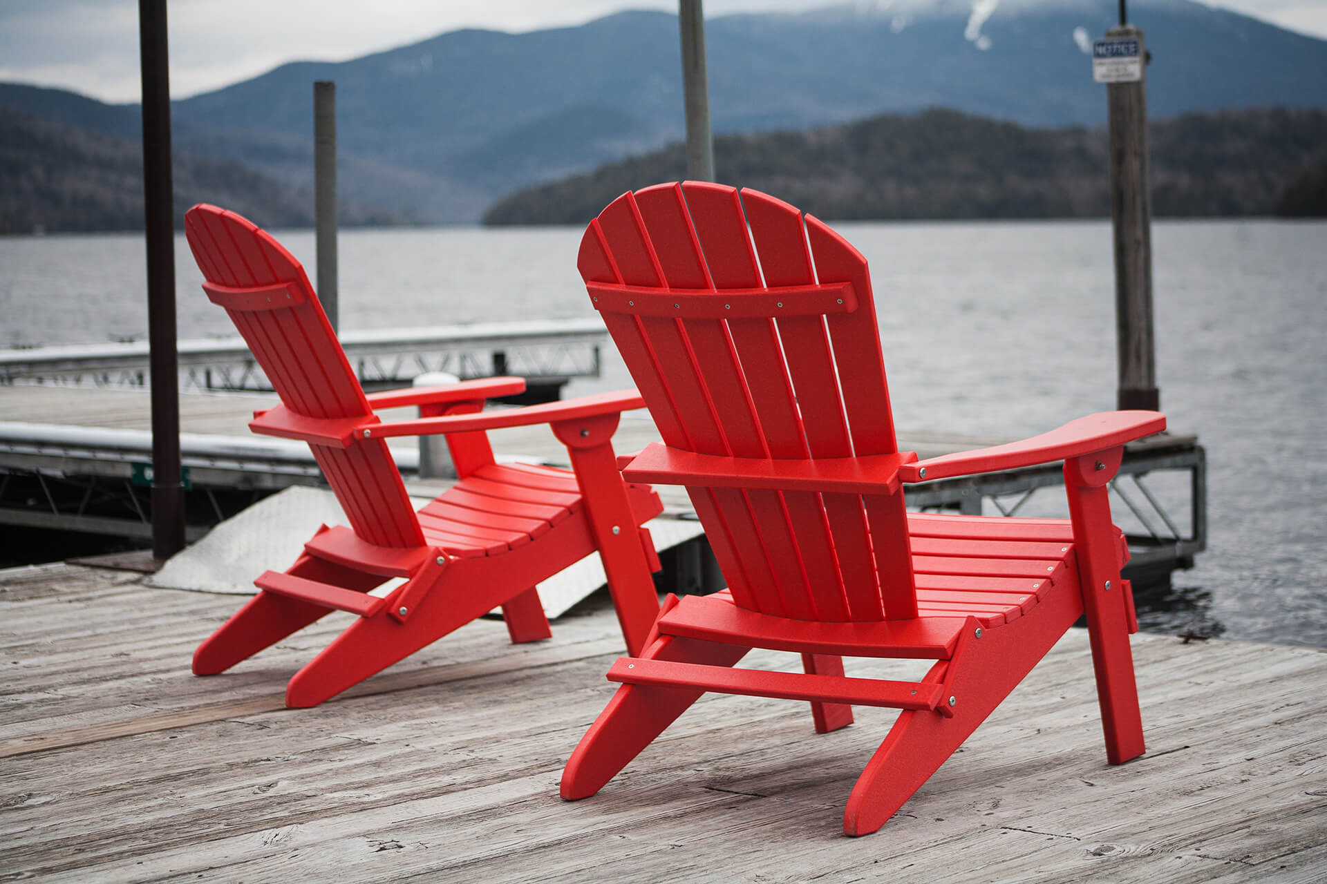 Red Adirondack Chairs Overlooking Mountain
