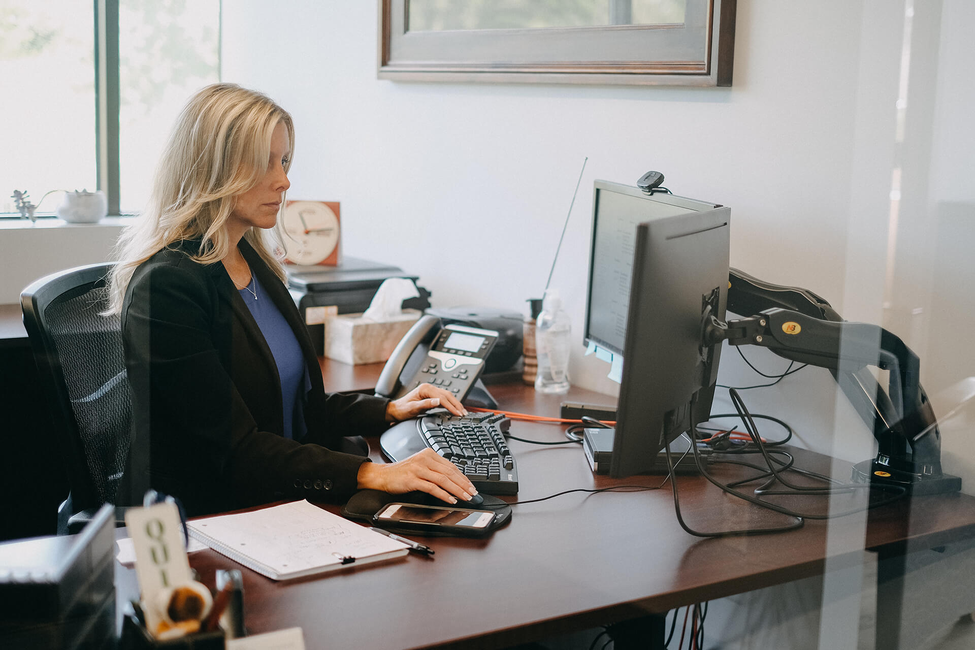 Serious Woman Working On Computer